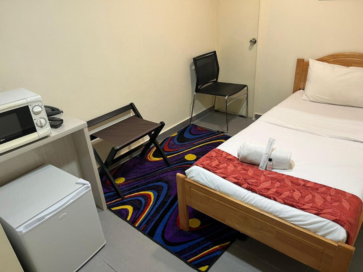 Single Sharing Room And Short Hours Stay At Sandpiper Hotel Singapur Exteriér fotografie
